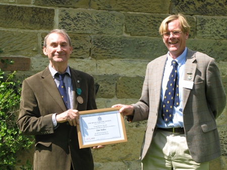 RFS Tim Tolliss left receives his award from RFS President Sir Jack Whitaker WEB 140617